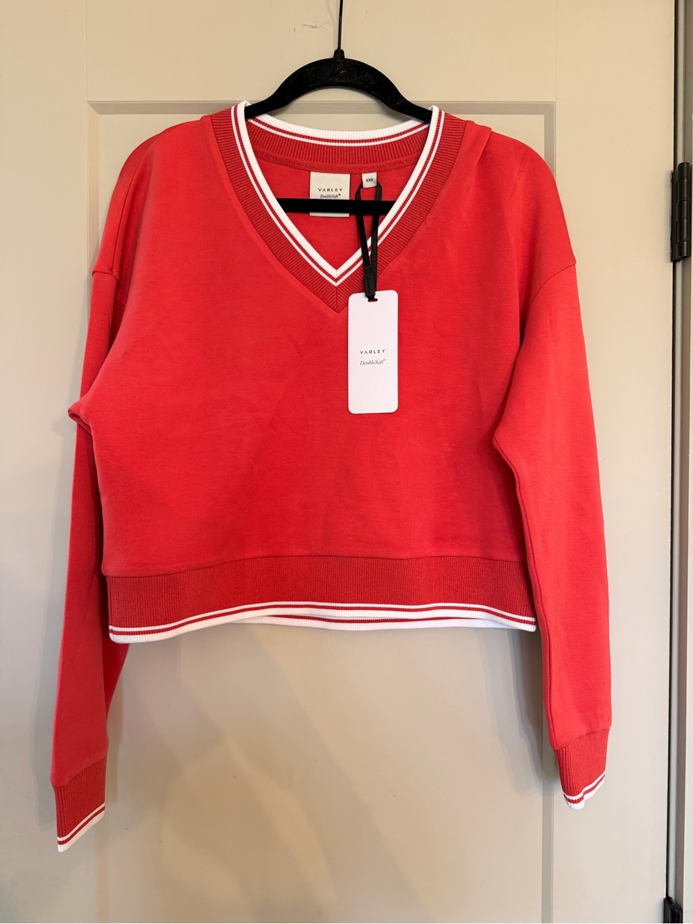 Varley Coral-Red V-Neck Cropped Sweater with White Stripe Trim